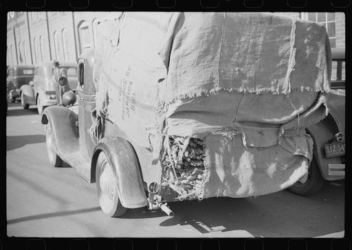 Untitled photo, possibly related to: Farmers put their tobacco in the handiest conveyance to bring to tobacco warehouse for auction. Durham, North Carolina