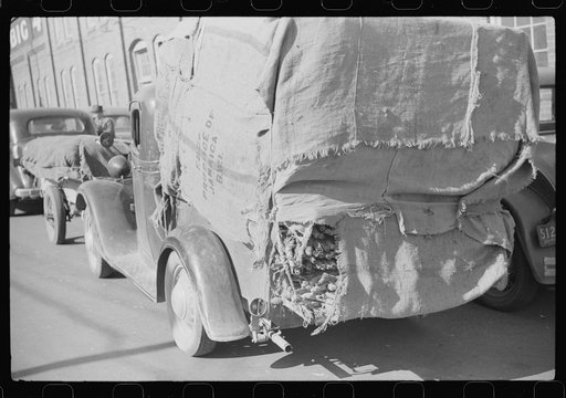 Farmers put their tobacco in the handiest conveyance to bring to tobacco warehouse for auction. Durham, North Carolina