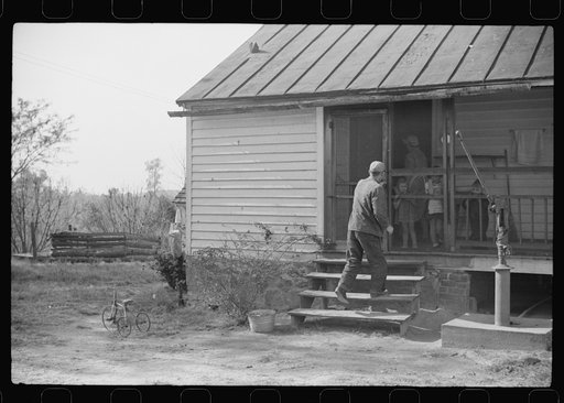 Untitled photo, possibly related to: One of the men who helped with corn shucking at the Fred Wilkins place, getting ready to "wash up" before dinner. Tally Ho, near Stem, Granville County, North Carolina