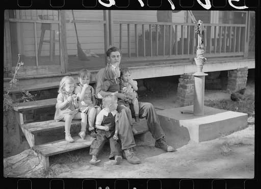 Untitled photo, possibly related to: Some of the children of the Wilkins clan on corn shucking day, Tally Ho, near Stem, Granville County, North Carolina