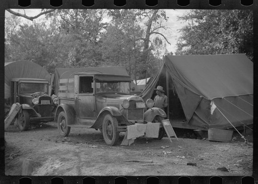 Untitled photo, possibly related to: Tents of Mexican labor brought from Texas by contractor for the duration of cotton picking season. Hopson Plantation near Clarksdale, Mississippi Delta, Mississippi