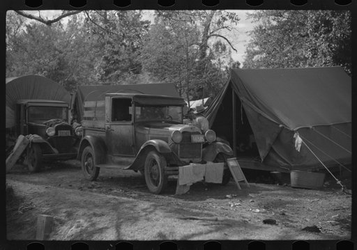 Untitled photo, possibly related to: Tents of Mexican labor brought from Texas by contractor for the duration of cotton picking season. Hopson Plantation near Clarksdale, Mississippi Delta, Mississippi