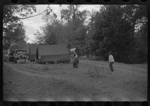 Untitled photo, possibly related to: Tents of Mexican labor brought from Texas by contractor for the duration of cotton picking season. Hopson Plantation near Clarksdale, Mississippi Delta, Mississippi