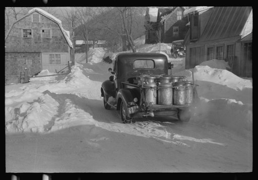 Farmers near Woodstock, Vermont, bring their cans of milk to the crossroads early every morning where it is picked up by the coop farmers' truck and is taken to the city