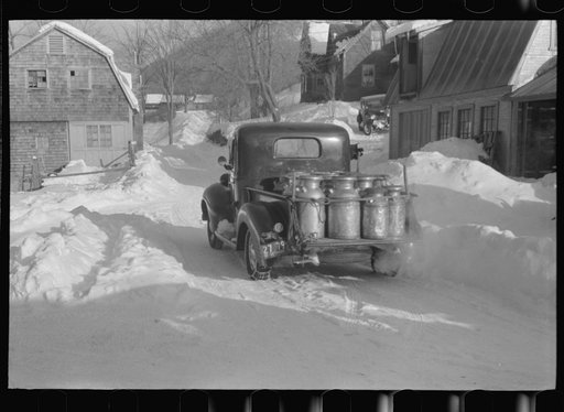 Untitled photo, possibly related to: Farmers near Woodstock, Vermont, bring their cans of milk to the crossroads early every morning where it is picked up by the coop farmers' truck and is taken to the city