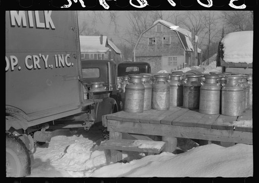 Untitled photo, possibly related to: Farmers near Woodstock, Vermont, bring their cans of milk to the crossroads early every morning where it is picked up by the coop farmers' truck and is taken to the city