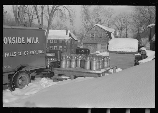 Untitled photo, possibly related to: Farmers near Woodstock, Vermont, bring their cans of milk to the crossroads early every morning where it is picked up by the coop farmers' truck and is taken to the city
