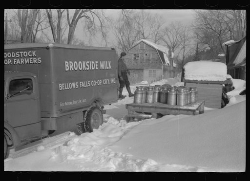 Untitled photo, possibly related to: Farmers near Woodstock, Vermont, bring their cans of milk to the crossroads early every morning where it is picked up by the coop farmers' truck and is taken to the city