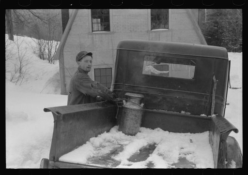 Untitled photo, possibly related to: Hired man on farm near Woodstock, Vermont, usually empties the radiator in his car every evening and refills it again with water in the morning to save the cost of antifreeze
