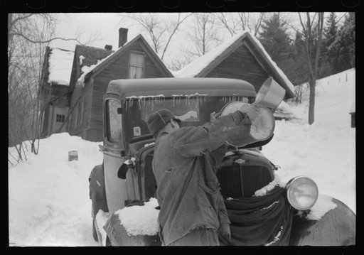 Hired man on farm near Woodstock, Vermont, usually empties the radiator in his car every evening and refills it again with water in the morning to save the cost of antifreeze