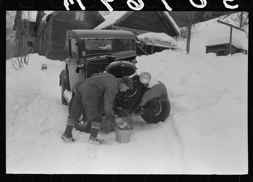 Hired man on farm near Woodstock, Vermont, usually empties the radiator in his car every evening and refills it again with water in the morning to save the cost of antifreeze