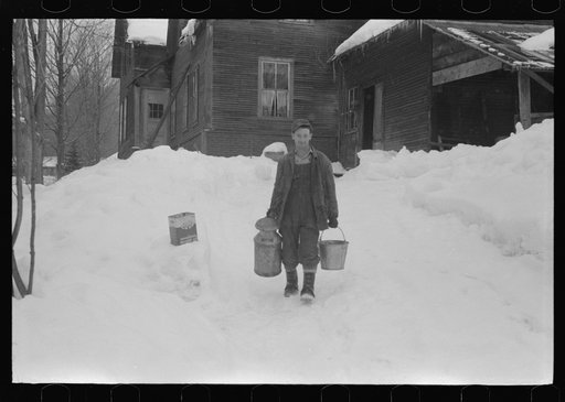 Untitled photo, possibly related to: Hired man on farm near Woodstock, Vermont, usually empties the radiator in his car every evening and refills it again with water in the morning to save the cost of antifreeze