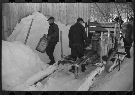 Untitled photo, possibly related to: Mr. Gilbert and hired man had to haul all their water in milk cans during winter months as all other sources of water supply were frozen. Woodstock, Vermont