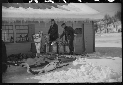 Untitled photo, possibly related to: Mr. Gilbert and hired man had to haul all their water in milk cans during winter months as all other sources of water supply were frozen. Woodstock, Vermont