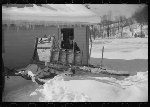 Untitled photo, possibly related to: Mr. Gilbert and hired man had to haul all their water in milk cans during winter months as all other sources of water supply were frozen. Woodstock, Vermont
