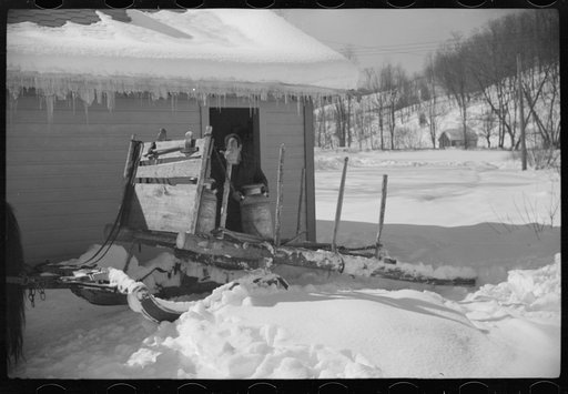 Untitled photo, possibly related to: Mr. Gilbert and hired man had to haul all their water in milk cans during winter months as all other sources of water supply were frozen. Woodstock, Vermont