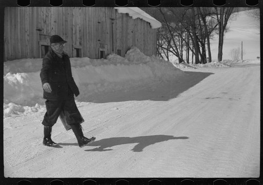 Untitled photo, possibly related to: Mr. Gilbert and hired man had to haul all their water in milk cans during winter months as all other sources of water supply were frozen. Woodstock, Vermont