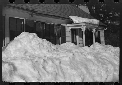 Untitled photo, possibly related to: Exceptionally deep snow and sliding snow from roof almost covered the windows of many farmhouses. Woodstock, Vermont