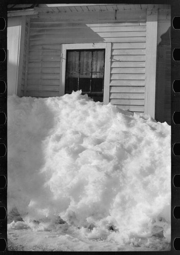 Untitled photo, possibly related to: Exceptionally deep snow and sliding snow from roof almost covered the windows of many farmhouses. Woodstock, Vermont
