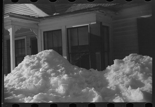 Untitled photo, possibly related to: Exceptionally deep snow and sliding snow from roof almost covered the windows of many farmhouses. Woodstock, Vermont