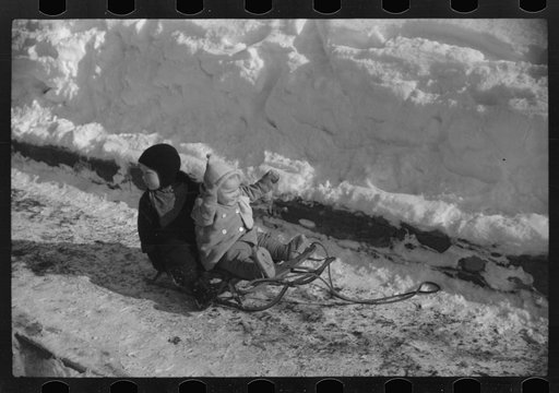 Untitled photo, possibly related to: Children ride on sleds almost all winter. Woodstock, Vermont