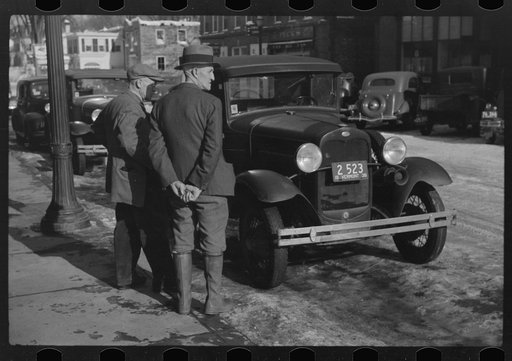 Townspeople of Woodstock, Vermont, discussing the severe winter on the street corner in center of town