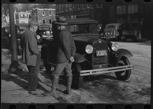 Untitled photo, possibly related to: Townspeople of Woodstock, Vermont, discussing the severe winter on the street corner in center of town