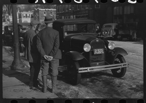 Untitled photo, possibly related to: Townspeople of Woodstock, Vermont, discussing the severe winter on the street corner in center of town