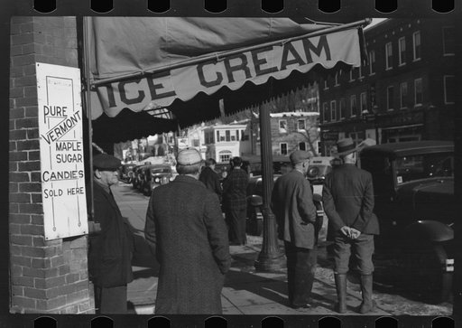 Untitled photo, possibly related to: Townspeople of Woodstock, Vermont, discussing the severe winter on the street corner in center of town