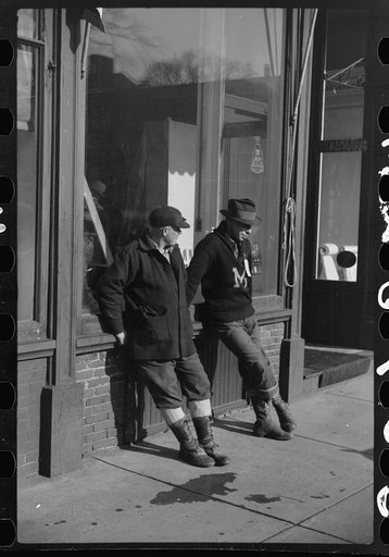 Untitled photo, possibly related to: Townspeople of Woodstock, Vermont, discussing the severe winter on the street corner in center of town