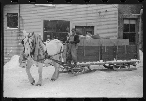Untitled photo, possibly related to: Woodstock, Vermont. Horse and sled of a garbage and rubbish collector