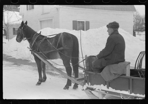 Untitled photo, possibly related to: Mr. G.W. Clarke, who is seventy-one years old and has always lived in Vermont brings his butter to town on Saturday to sell to his customers in Woodstock, Vermont