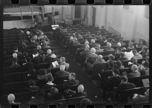 Untitled photo, possibly related to: Townspeople listening to discussion and balloting during town meeting.  Woodstock, Vermont