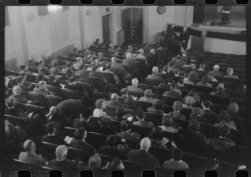 Untitled photo, possibly related to: Townspeople listening to discussion and balloting during town meeting.  Woodstock, Vermont