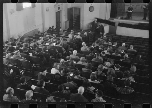 Untitled photo, possibly related to: Townspeople listening to discussion and balloting during town meeting.  Woodstock, Vermont