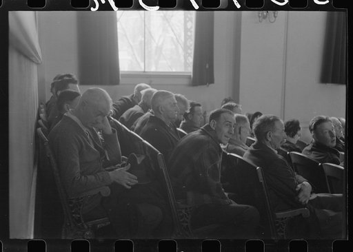 Townspeople listening to discussion during meeting, Woodstock, Vermont