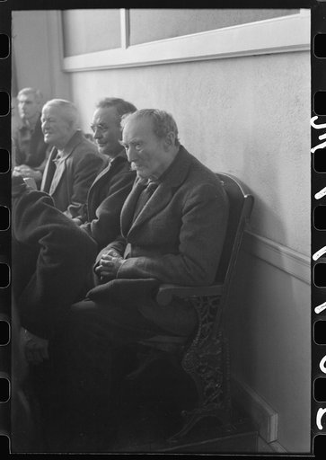 Townspeople listening to discussion during town meeting, Woodstock, Vermont
