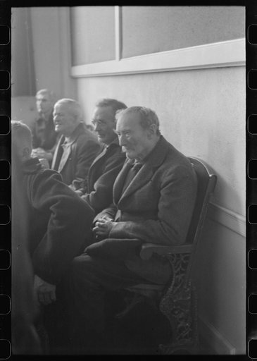Untitled photo, possibly related to: Townspeople listening to discussion during town meeting, Woodstock, Vermont