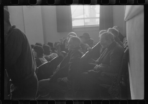 Untitled photo, possibly related to: Townspeople listening to discussion during town meeting, Woodstock, Vermont