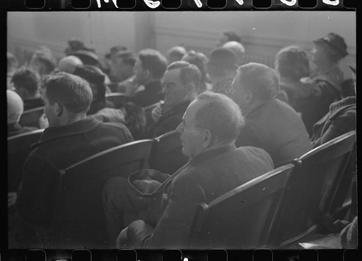 Untitled photo, possibly related to: Townspeople listening to discussion during town meeting, Woodstock, Vermont