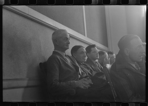 Townspeople listening to discussion during town meeting, Woodstock, Vermont