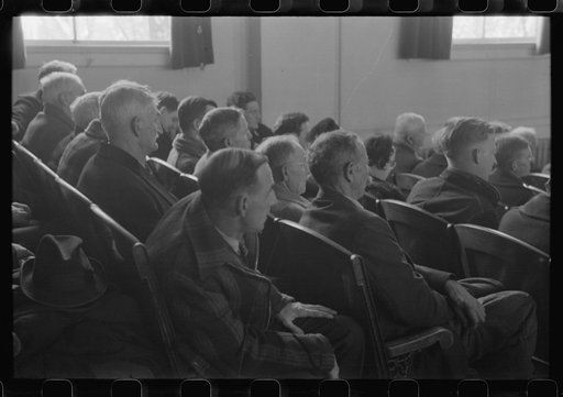 Untitled photo, possibly related to: Townspeople listening to discussion during town meeting, Woodstock, Vermont
