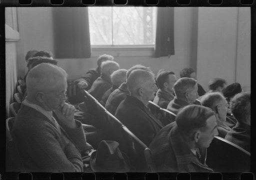 Untitled photo, possibly related to: Townspeople listening to discussion during town meeting, Woodstock, Vermont