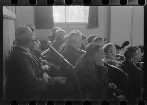 Untitled photo, possibly related to: Townspeople listening to discussion during town meeting, Woodstock, Vermont
