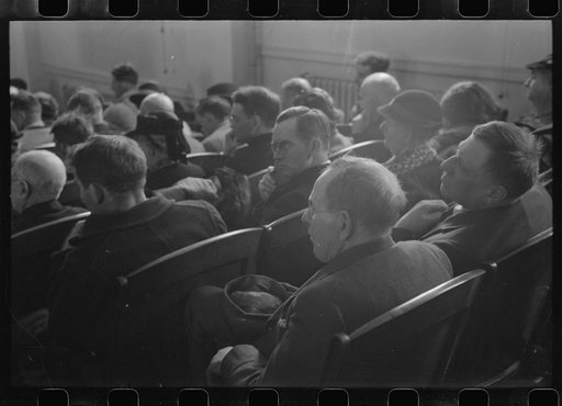 Untitled photo, possibly related to: Townspeople listening to discussion during town meeting, Woodstock, Vermont