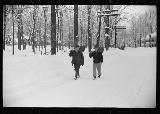 Untitled photo, possibly related to: Clearing off the sidewalk after the snowstorm in front of White Cupboard Inn, Woodstock, Vermont