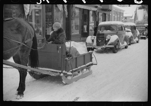 Untitled photo, possibly related to: Mr. G.W. Clarke coming to town to sell butter on Saturday. Woodstock, Vermont. He is seventy-one years old and has always been a resident of Vermont