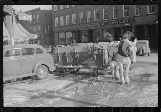 Untitled photo, possibly related to: Collecting rubbish with sled in winter. Woodstock, Vermont