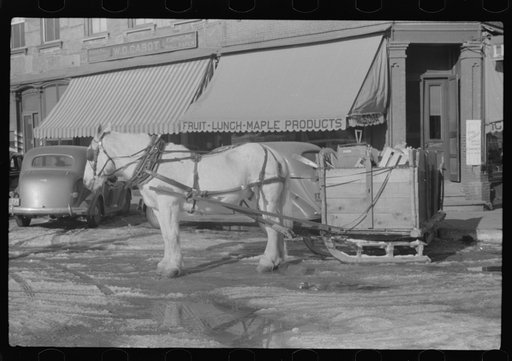 Untitled photo, possibly related to: Collecting rubbish with sled in winter. Woodstock, Vermont
