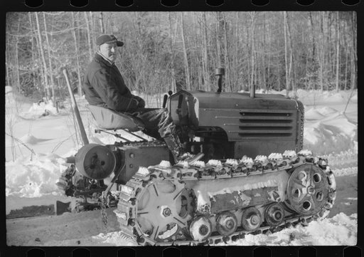 Untitled photo, possibly related to: Hauling timber by tractor to the road where it is taken by truck to the mill. Near Barnard, Windsor County, Vermont